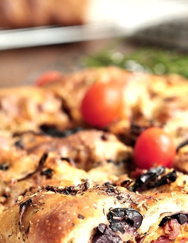 Focaccia with red onion, sundried tomatoes, kalamata olives and Italian herbs
