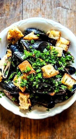 Beer-Steamed Mussels with Mustard, Creme Fraiche, Parmesan Croutons & Herbs (via Camille Styles)